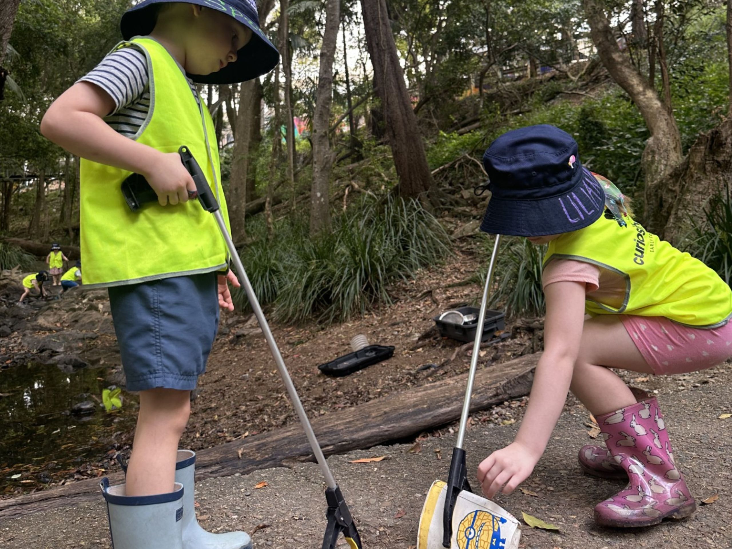 Collecting trash during bush kindy